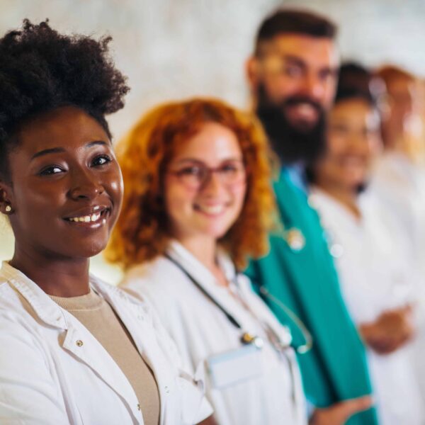 AdobeStock_478335998 group of happy doctors at hospital